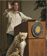 Image of Jeff Corwin speaking at a podium at the Smithsonian.