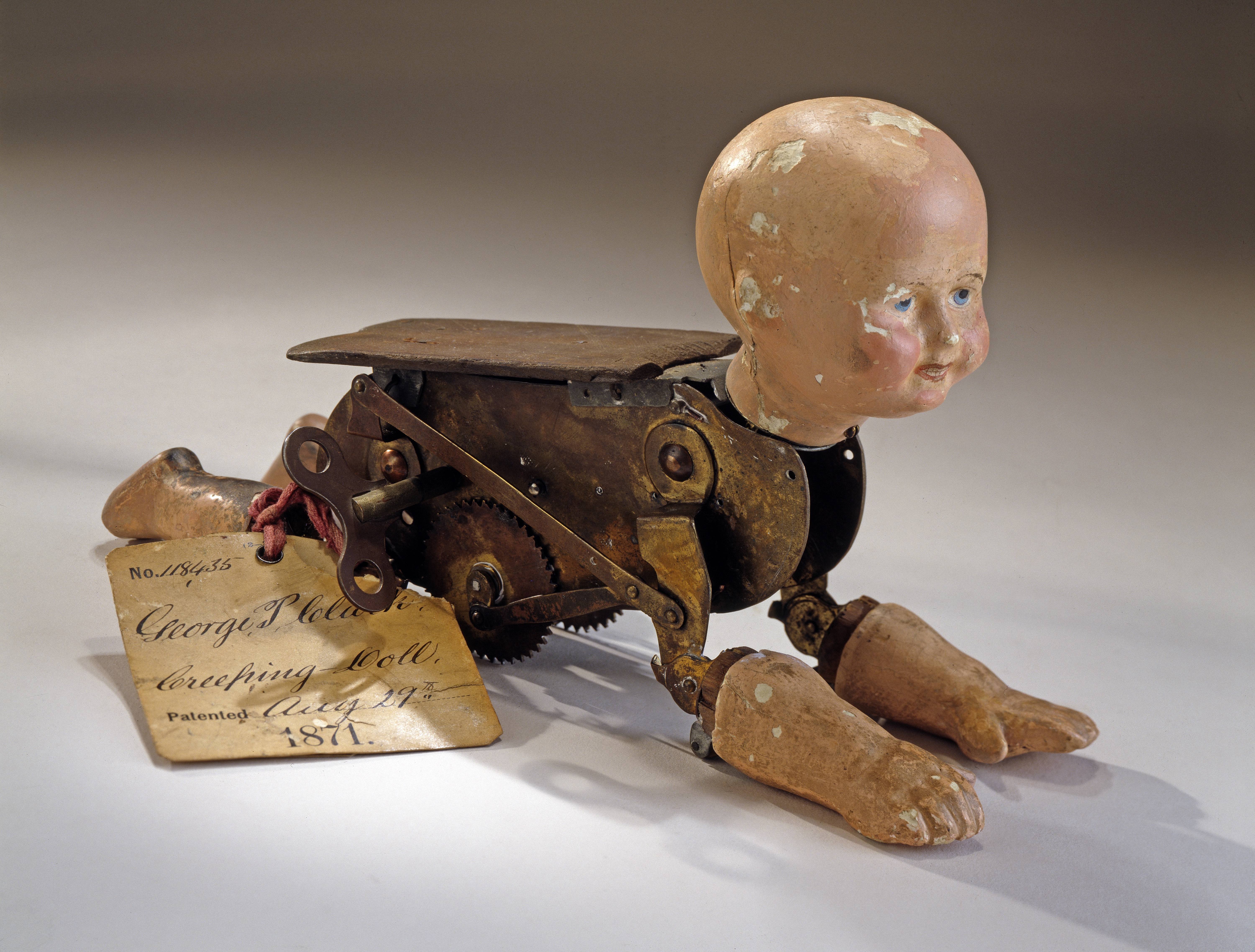Как в старину называли ползающего ребенка. Механические игрушки-автоматоны 19 век. Механический автоматон 19 века. Старинные механические куклы. Старые игрушки.