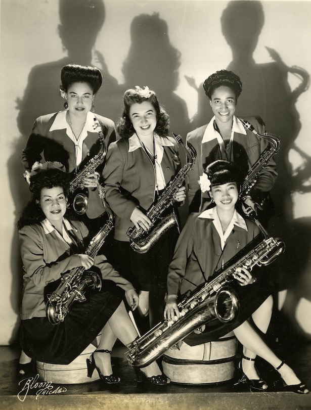 Saxophone section of the International Sweethearts of Rhythm posing with their instruments, 1944.