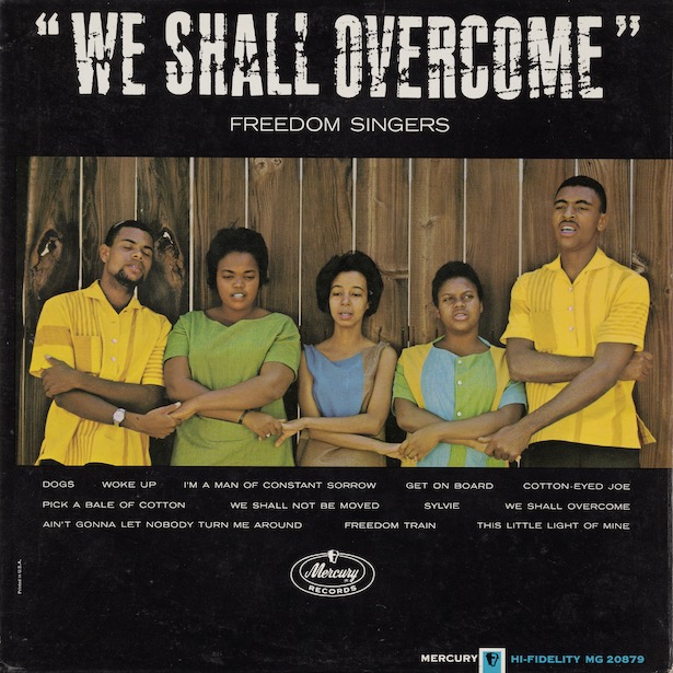 Cover of 1963 Freedom Singers LP record, We Shall Overcome, with photo of band members linking hands.