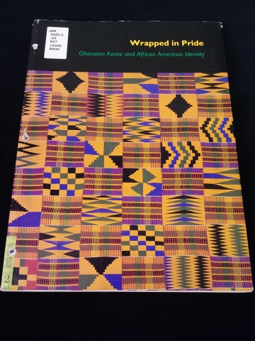 Cover of the book Wrapped in Pride showing an abstract pattern of Kente Cloth designs