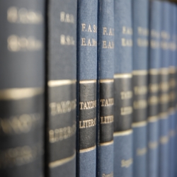 Close up view of the spines of books